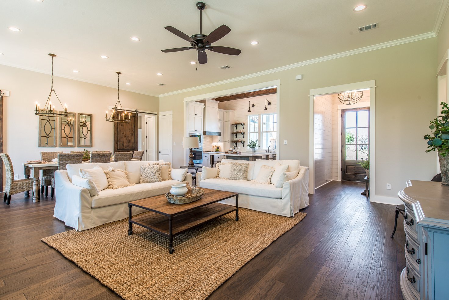 Beautiful family room with wood flooring and large rug