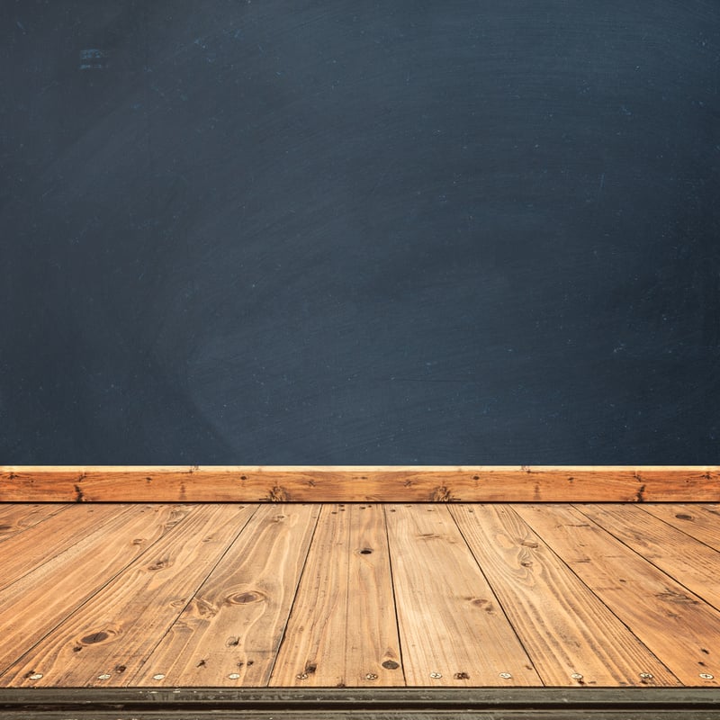 Black Board Walls and Wood Floor